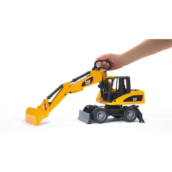 Pelleteuse Caterpillar sur roues