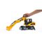 Pelleteuse Caterpillar sur roues